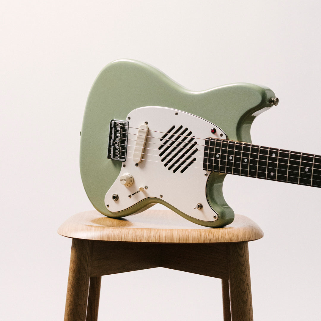 1990's FujiGen Fox xmasguitarcompany MG-1, 24" scale, Built-in Amp, Speaker, Tremelo Effect, Sonic Blue