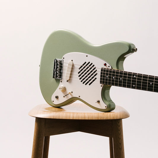 1990's FujiGen Fox xmasguitarcompany MG-1, 24" scale, Built-in Amp, Speaker, Tremelo Effect, Sonic Blue