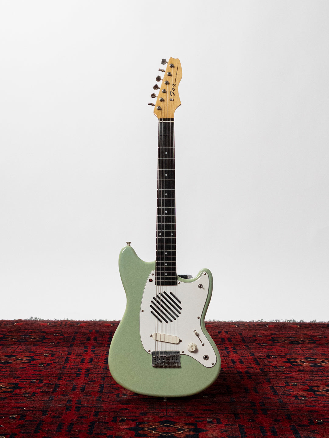 1990's FujiGen Fox xmasguitarcompany MG-1, 24" scale, Built-in Amp, Speaker, Tremelo Effect, Sonic Blue